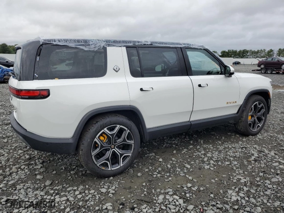 2023 Rivian R1S Adventure with VIN 7PDSGABA6PN017889, listed as a Copart auction lot 68860864 with 7,661 mi miles and Salvage Title. Bid and sale history available at carsss.com. Image 3.