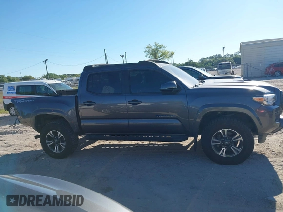 2017 Toyota Tacoma SR5 with VIN 5TFAZ5CNXHX050289, listed as a IAAI auction lot 41771576 with 68,735 mi miles and . Bid and sale history available at carsss.com. Image 14.