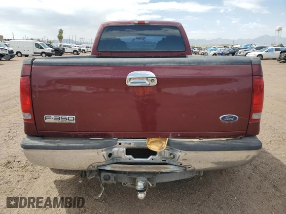 2005 Ford F-350 XL z VIN 1FTWW32P35ED08827, wystawiony jako Copart lot #56028555 z przebiegiem 198 768 mil mil oraz Czysty tytuł • Clean title. Historia ofert i sprzedaży dostępna na DreamBid. Obrazek 6.