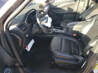 2021 Ford Escape Titanium with VIN 1FMCU9J90MUB16909, listed as a Copart auction lot 42547724 with 24,300 mi miles and Salvage Title. Bid and sale history available at carsss.com. Image 7.
