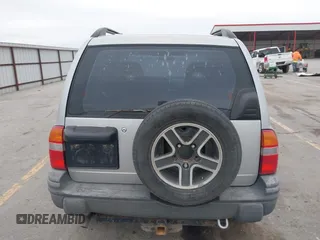 2003 Chevrolet Tracker z VIN 2CNBE134736919970, wystawiony jako IAAI lot #42203446 z przebiegiem 158 872 mil mil oraz . Historia ofert i sprzedaży dostępna na DreamBid. Obrazek 16.