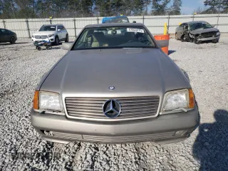 1990 Mercedes-Benz 500 z VIN WDBFA66E8LF010613, wystawiony jako Copart lot #47093275 z przebiegiem 120 814 mil mil oraz Szkody całkowita. Historia ofert i sprzedaży dostępna na DreamBid. Obrazek 5.