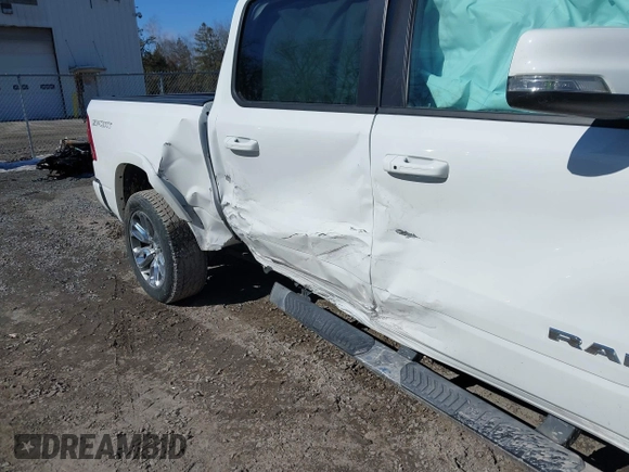 2022 Ram 1500 Laramie with VIN 1C6SRFJTXNN237199, listed as a IAAI auction lot 41705536 with 35,143 mi miles and . Bid and sale history available at DreamBid. Image 6.