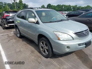 2006 Lexus RX 400h with VIN JTJHW31U260024648, listed as a IAAI auction lot 42632917 with 246,808 mi miles and . Bid and sale history available at DreamBid. Image 1.