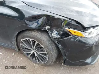 2019 Toyota Camry LE z VIN 4T1B11HK0KU739121, wystawiony jako IAAI lot #42372066 z przebiegiem 95 576 mil mil oraz . Historia ofert i sprzedaży dostępna na DreamBid. Obrazek 6.