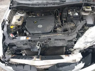 2009 Mazda Mazda5 Sport with VIN JM1CR293890350839, listed as a IAAI auction lot 40851953 with 353,410 mi miles. Bid and sale history available at carsss.com. Image 10.
