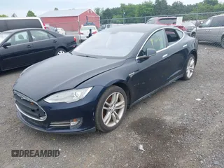 2014 Tesla Model S 60 with VIN 5YJSA1H19EFP32063, listed as a IAAI auction lot 42360872 with 103,495 mi miles and . Bid and sale history available at DreamBid. Image 2.