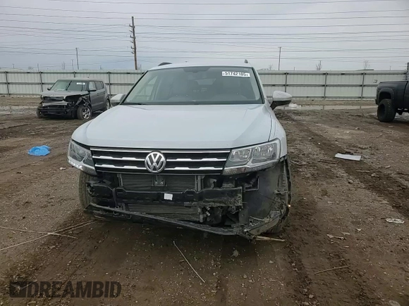 2018 Volkswagen Tiguan SEL z VIN 3VV3B7AX2JM001338, wystawiony jako Copart lot #51742105 z przebiegiem 71 555 mil mil oraz Szkoda całkowita • Salvage title. Historia ofert i sprzedaży dostępna na DreamBid. Obrazek 12.
