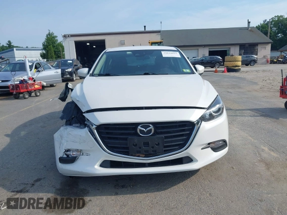 2018 Mazda 3 Touring z VIN 3MZBN1L35JM210093, wystawiony jako IAAI lot #39810891 z przebiegiem 110 052 mil mil oraz . Historia ofert i sprzedaży dostępna na DreamBid. Obrazek 12.
