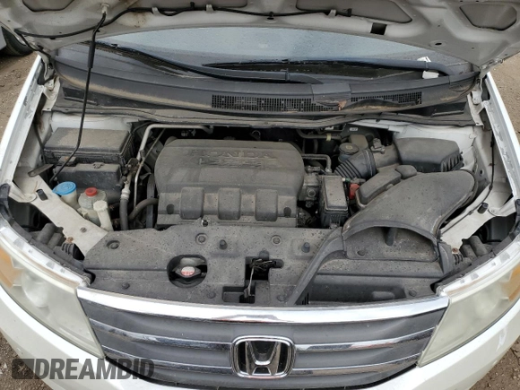 2012 Honda Odyssey Touring with VIN 5FNRL5H92CB047020, listed as a Copart auction lot 56539795 with 155,788 mi miles and Clean Title. Bid and sale history available at DreamBid. Image 12.