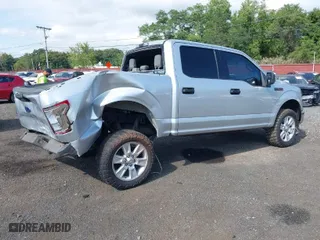 2015 Ford F-150 XL with VIN 1FTEW1CF0FFA40966, listed as a IAAI auction lot 40277006 with 156,433 mi miles. Bid and sale history available at carsss.com. Image 4.