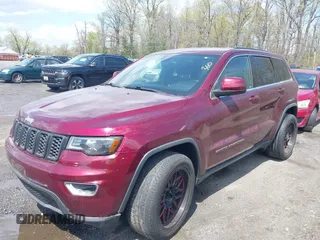 2017 Jeep Grand Cherokee Laredo with VIN 1C4RJEAG4HC965368, listed as a IAAI auction lot 42034698 with 110,152 mi miles. Bid and sale history available at carsss.com. Image 2.