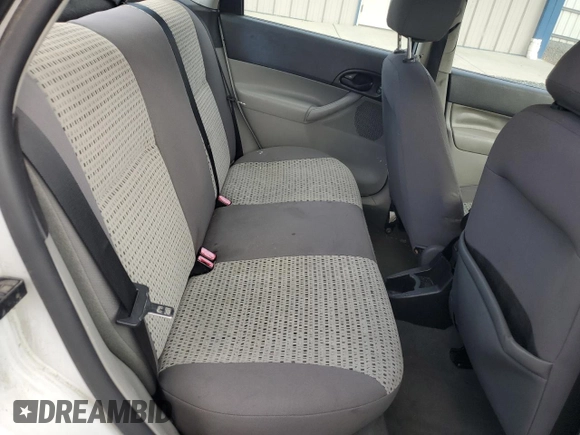 2007 Ford Focus S with VIN 1FAHP34N27W229136, listed as a Copart auction lot 52704755 with 322,968 mi miles and Salvage Title. Bid and sale history available at carsss.com. Image 10.