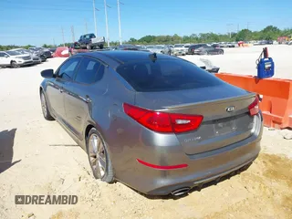 2015 Kia Optima SX Turbo with VIN 5XXGR4A63FG384894, listed as a IAAI auction lot 41843637 with 101,364 mi miles and . Bid and sale history available at DreamBid. Image 3.