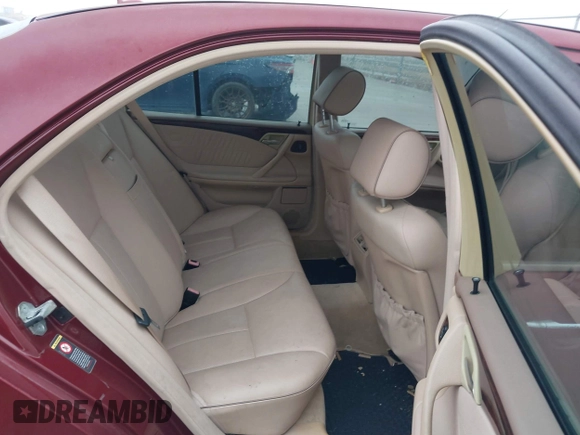 2000 Mercedes-Benz E-Class with VIN WDBJF65J1YB113770, listed as a IAAI auction lot 41462464 with 157,279 mi miles. Bid and sale history available at carsss.com. Image 8.