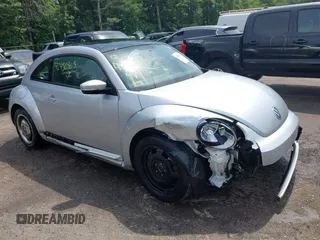 2013 Volkswagen Beetle 2.5L with VIN 3VWJX7AT5DM654445, listed as a IAAI auction lot 42450363 with 97,161 mi miles and . Bid and sale history available at DreamBid. Image 1.