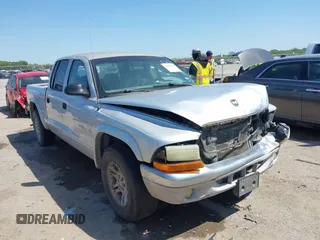 2002 Dodge Dakota z VIN 1B7HL48Z92S668049, wystawiony jako IAAI lot #41995895 z przebiegiem 439 857 mil mil oraz . Historia ofert i sprzedaży dostępna na DreamBid. Obrazek 1.