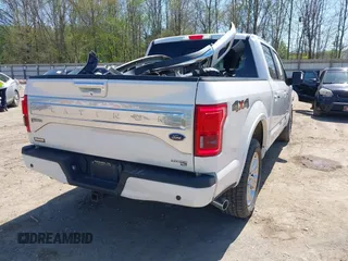 2015 Ford F-150 XLT with VIN 1FTEW1EF2FFB38104, listed as a IAAI auction lot 41983756 with 114,315 mi miles. Bid and sale history available at carsss.com. Image 4.