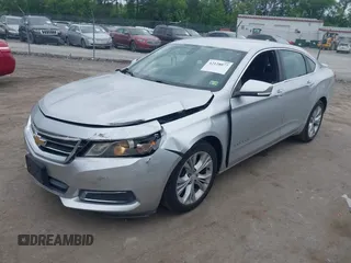 2014 Chevrolet Impala LT with VIN 2G1125S3XE9114130, listed as a IAAI auction lot 42128077 with 209,391 mi miles and . Bid and sale history available at DreamBid. Image 2.