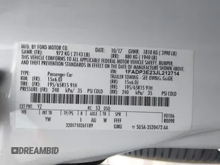 2018 Ford Focus S with VIN 1FADP3E23JL212714, listed as a IAAI auction lot 41895883 with 116,658 mi miles. Bid and sale history available at carsss.com. Image 9.