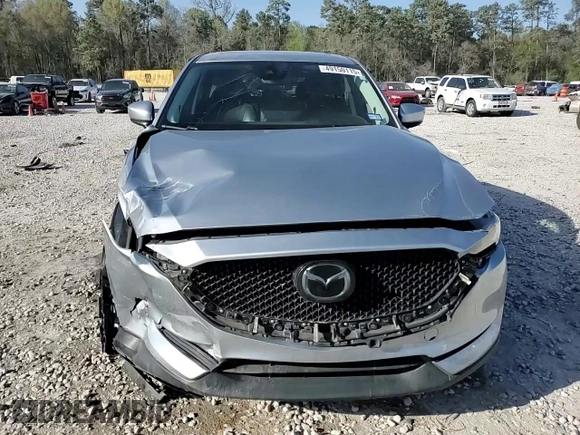 2021 Mazda CX-5 Grand Touring with VIN JM3KFADM8M1339008, listed as a Copart auction lot 49150115 with 144,851 mi miles and Salvage Title. Bid and sale history available at carsss.com. Image 15.