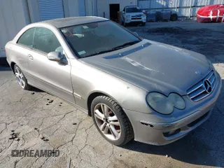 2006 Mercedes-Benz CLK-Class 3.5L with VIN WDBTJ56J86F197981, listed as a IAAI auction lot 41530032 with 242,295 mi miles. Bid and sale history available at carsss.com. Image 1.