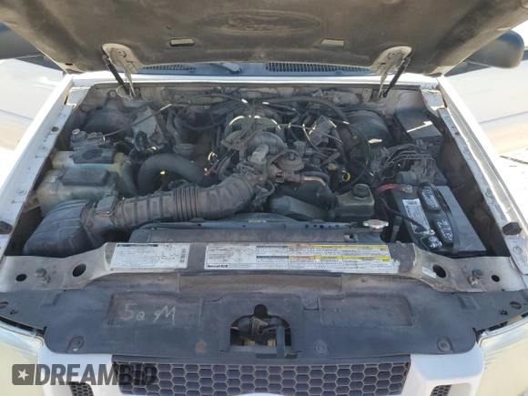 2001 Ford Explorer Sport Trac with VIN 1FMZU77E51UC58042, listed as a Copart auction lot 43115175 with 274,557 mi miles and Salvage title. Bid and sale history available at DreamBid. Image 11.