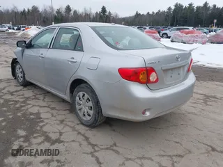 2010 Toyota Corolla with VIN 2T1BU4EE2AC291410, listed as a IAAI auction lot 41709795 with 148,598 mi miles. Bid and sale history available at carsss.com. Image 3.