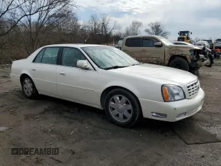 2003 Cadillac DeVille DTS z VIN 1G6KF57993U201484, wystawiony jako Copart lot #43742375 z przebiegiem 53 478 mil mil oraz Szkody całkowita. Historia ofert i sprzedaży dostępna na DreamBid. Obrazek 4.