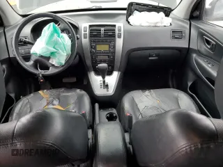 2009 Hyundai Tucson SE with VIN KM8JN72D49U975875, listed as a Copart auction lot 76923954 with 167,155 mi miles and Salvage Title. Bid and sale history available at carsss.com. Image 8.