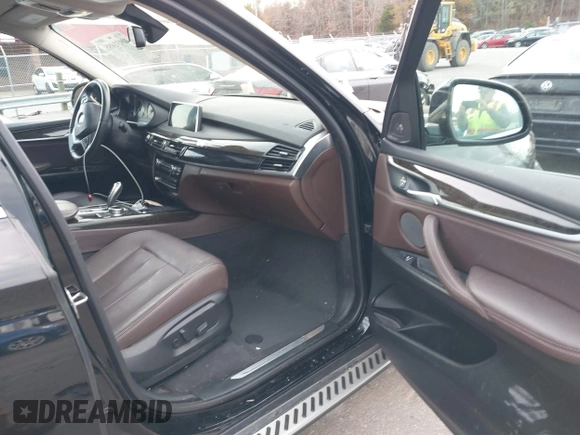 2016 BMW X5 sDrive35i with VIN 5UXKR2C59G0U17661, listed as a IAAI auction lot 40931088 with 90,963 mi miles. Bid and sale history available at carsss.com. Image 5.