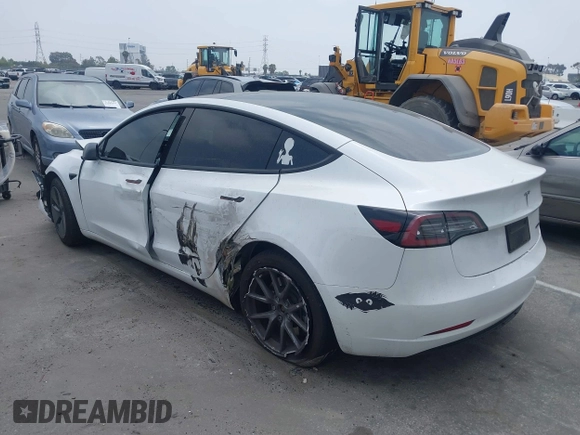 2023 Tesla Model 3 with VIN 5YJ3E1EA2PF417959, listed as a IAAI auction lot 42463853 with 22,736 mi miles and . Bid and sale history available at DreamBid. Image 3.