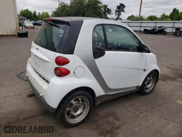 2012 Smart fortwo Pure с VIN WMEEJ3BA1CK573090, выставлен на аукционе Copart как лот 59881025 с пробегом 128 086 миль миль и Чистый • Clean title. История ставок и продаж доступна на DreamBid. Изображение 3.