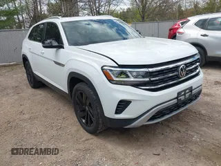 2023 Volkswagen Atlas SE with VIN 1V2KC2CA5PC214764, listed as a IAAI auction lot 42192334 with 40,148 mi miles and . Bid and sale history available at DreamBid. Image 1.