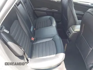 2017 Ford Fusion Hybrid SE с VIN 3FA6P0LU5HR285381, выставлен на аукционе IAAI как лот 42597789 с пробегом 129 662 миль миль и . История ставок и продаж доступна на DreamBid. Изображение 8.