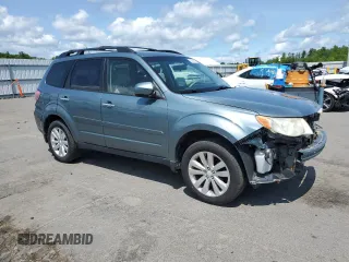 2012 Subaru Forester X Premium with VIN JF2SHADC2CH425710, listed as a Copart auction lot 58786535 with 100,424 mi miles and Salvage title. Bid and sale history available at DreamBid. Image 4.