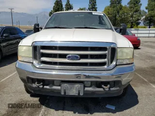 2002 Ford F-250 XL с VIN 1FTNX21F12EA20666, выставлен на аукционе Copart как лот 52757205 с пробегом 251 257 миль миль и Списание • Salvage title. История ставок и продаж доступна на DreamBid. Изображение 5.