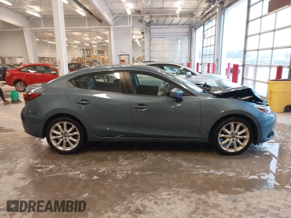 2014 Mazda 3 S Grand Touring with VIN JM1BM1W31E1182703, listed as a IAAI auction lot 41470742 with 123,956 mi miles and . Bid and sale history available at DreamBid. Image 13.