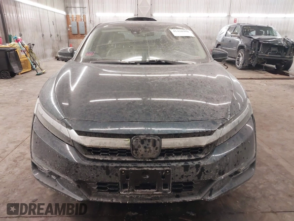 2018 Honda Clarity Touring z VIN JHMZC5F39JC002521, wystawiony jako IAAI lot #41428968 z przebiegiem 64 014 mil mil oraz . Historia ofert i sprzedaży dostępna na DreamBid. Obrazek 13.