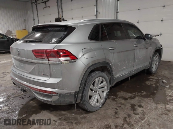 2021 Volkswagen Atlas SE z VIN 1V2HE2CA9MC219076, wystawiony jako IAAI lot #41608670 z przebiegiem 56 162 mil mil oraz . Historia ofert i sprzedaży dostępna na DreamBid. Obrazek 4.