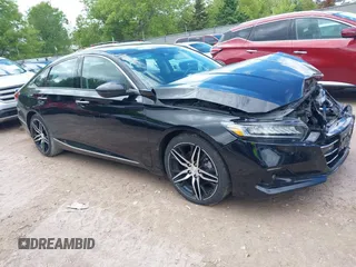 2021 Honda Accord Touring z VIN 1HGCV2F91MA022042, wystawiony jako IAAI lot #42301183 z przebiegiem 67 397 mil mil oraz . Historia ofert i sprzedaży dostępna na DreamBid. Obrazek 1.