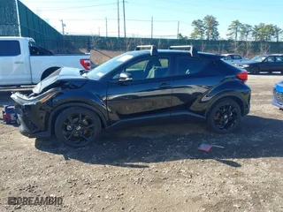 2022 Toyota C-HR XLE with VIN JTNKHMBX9N1130195, listed as a IAAI auction lot 41867899 with 13,813 mi miles. Bid and sale history available at carsss.com. Image 14.