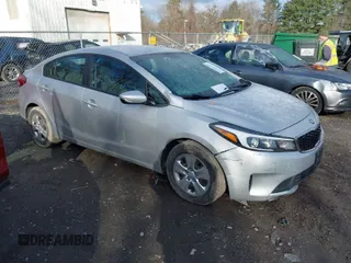2018 Kia Forte LX with VIN 3KPFK4A74JE167784, listed as a IAAI auction lot 41969966 with 76,521 mi miles. Bid and sale history available at carsss.com. Image 1.