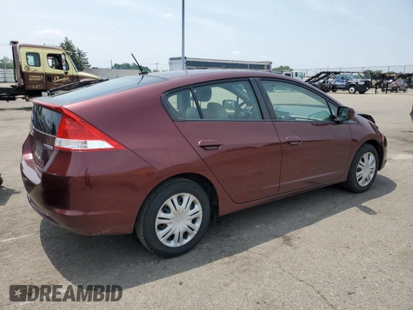 2011 Honda Insight with VIN JHMZE2H31BS008097, listed as a Copart auction lot 60780625 with 111,688 mi miles and Salvage title. Bid and sale history available at DreamBid. Image 3.