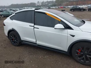 2022 Tesla Model X Plaid z VIN 7SAXCBE67NF339557, wystawiony jako IAAI lot #41825360 z przebiegiem 70 mil mil oraz . Historia ofert i sprzedaży dostępna na DreamBid. Obrazek 6.