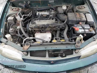 1998 Mitsubishi Mirage DE z VIN JA3AY26A2WU042095, wystawiony jako Copart lot #84700394 z przebiegiem 124 362 mil mil oraz Czysty tytuł • Clean title. Historia ofert i sprzedaży dostępna na DreamBid. Obrazek 11.