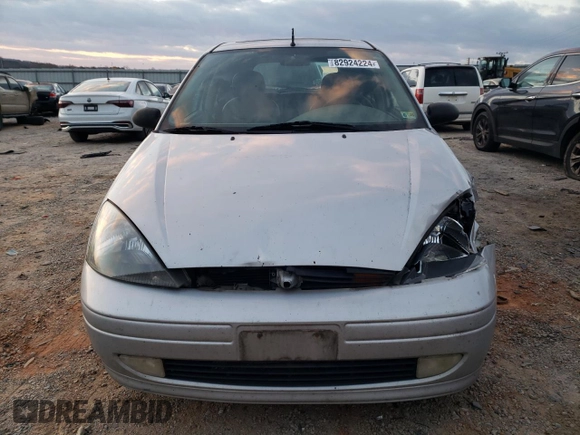 2004 Ford Focus with VIN 3FAFP37Z94R105076, listed as a Copart auction lot 82924224 with 218,253 mi miles and Clean title. Bid and sale history available at DreamBid. Image 5.