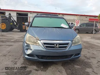2007 Honda Odyssey EX-L z VIN 5FNRL38717B035384, wystawiony jako IAAI lot #41976861 z przebiegiem 211 640 mil mil oraz . Historia ofert i sprzedaży dostępna na DreamBid. Obrazek 12.