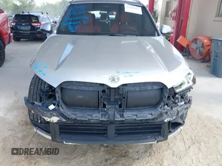 2023 BMW X1 xDrive28i z VIN WBX73EF09P5W51069, wystawiony jako IAAI lot #42145061 z przebiegiem 24 960 mil mil oraz . Historia ofert i sprzedaży dostępna na DreamBid. Obrazek 6.