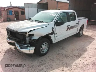 2023 Ford F-150 XL with VIN 1FTEW1CB6PKD82458, listed as a Copart auction lot 48912975 with 31,245 mi miles and Salvage Title. Bid and sale history available at carsss.com. Image 1.